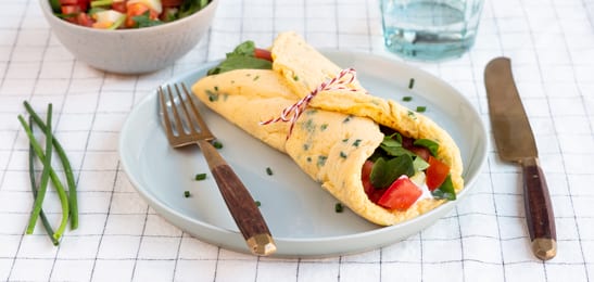 Recept van het Voedingscentrum: Eiwrap met spinazie en tomaatjes